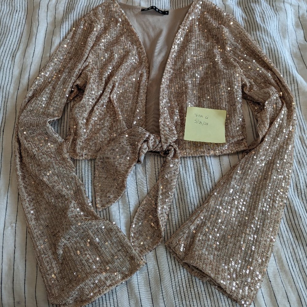 Gold sequin wrap or shrug with bell sleeves